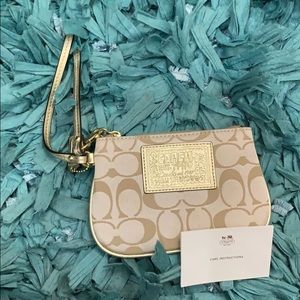 (NWOT) Gold Coach Wrislet